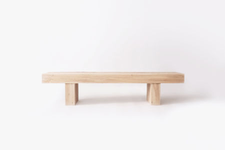A simple bench made in tribute to natures raw material by Olli Karvonen